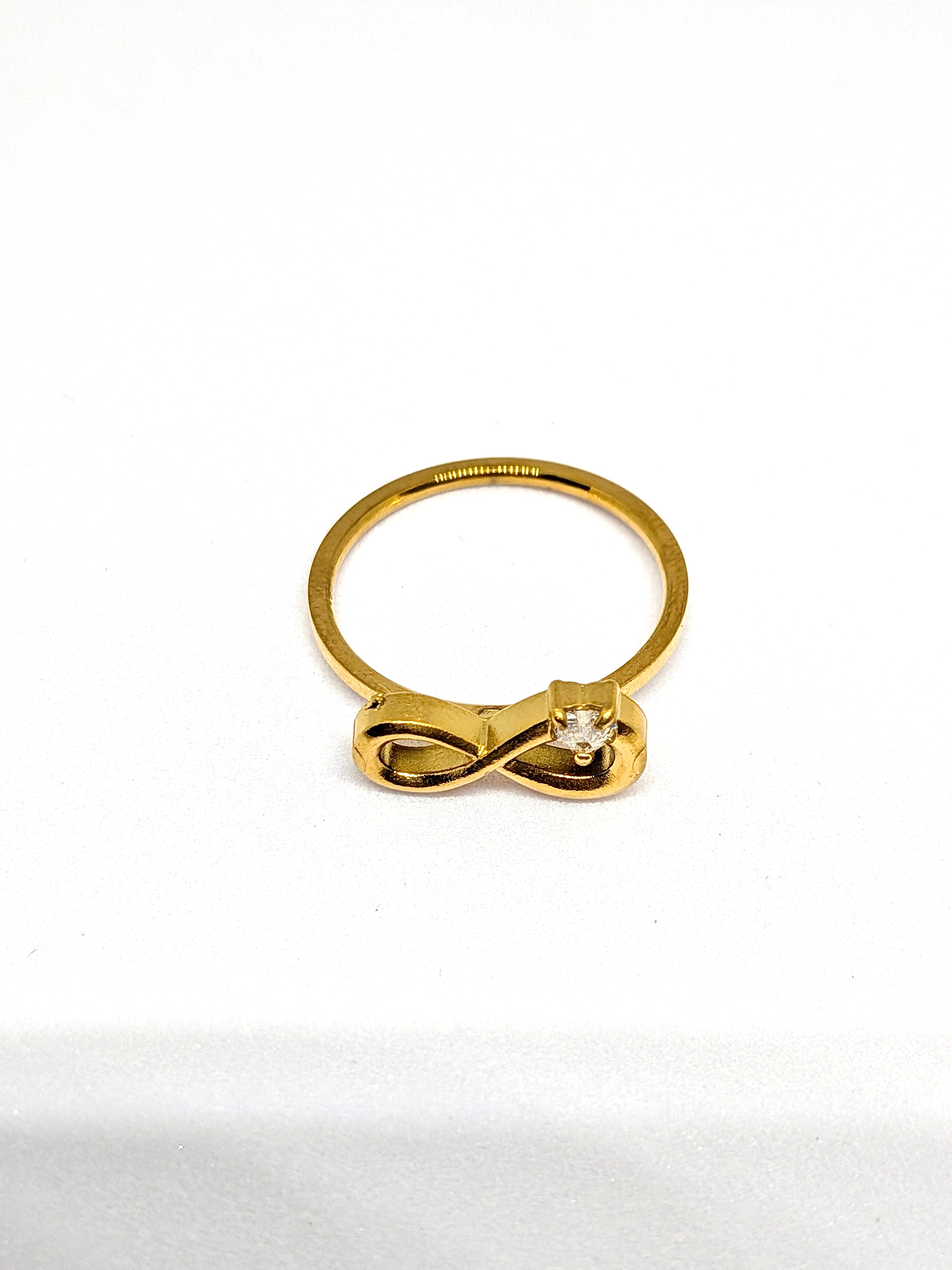 Infinity studded ring