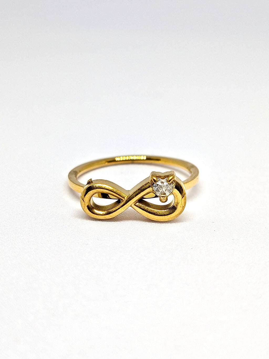 Infinity studded ring