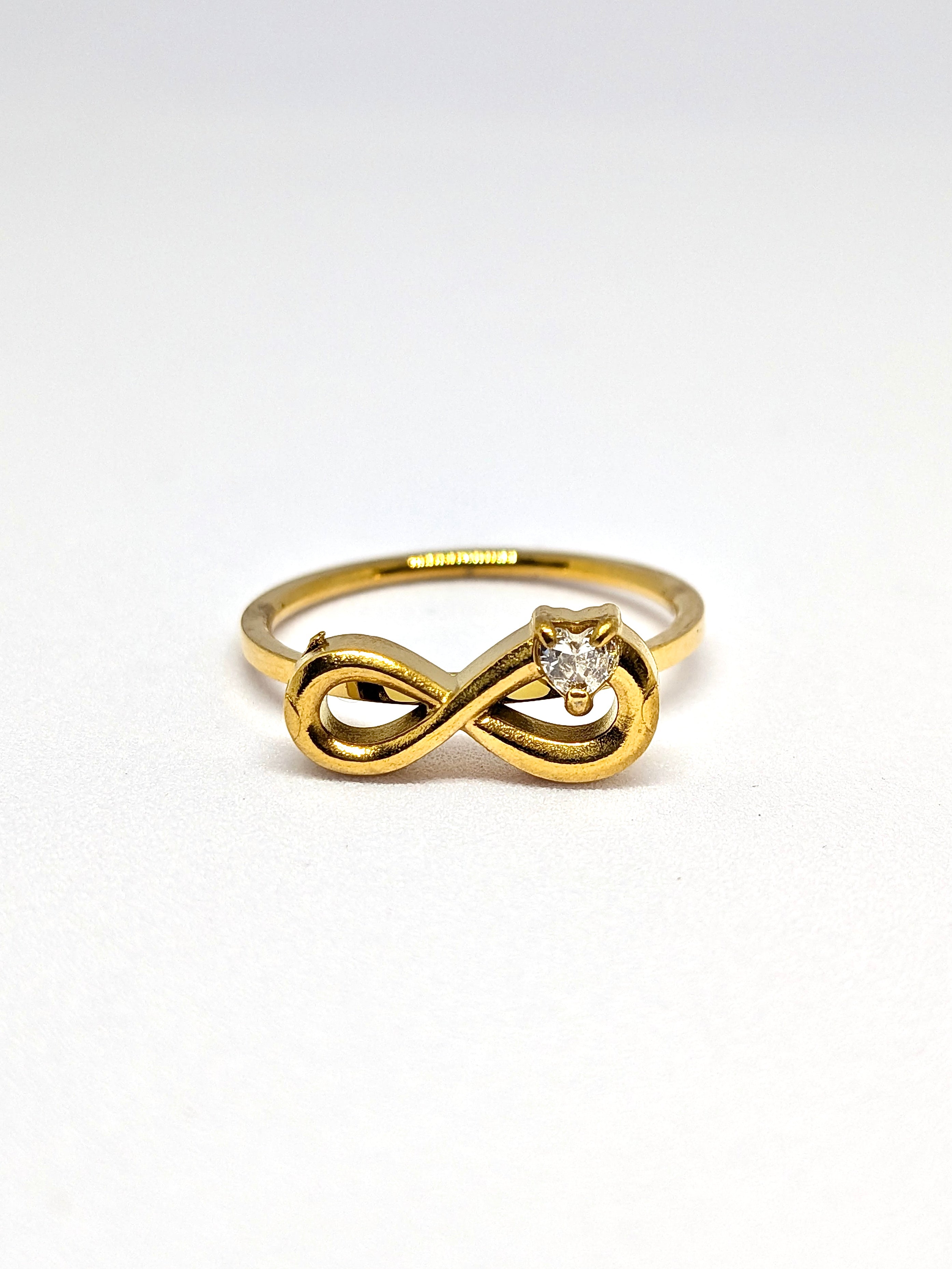 Infinity studded ring