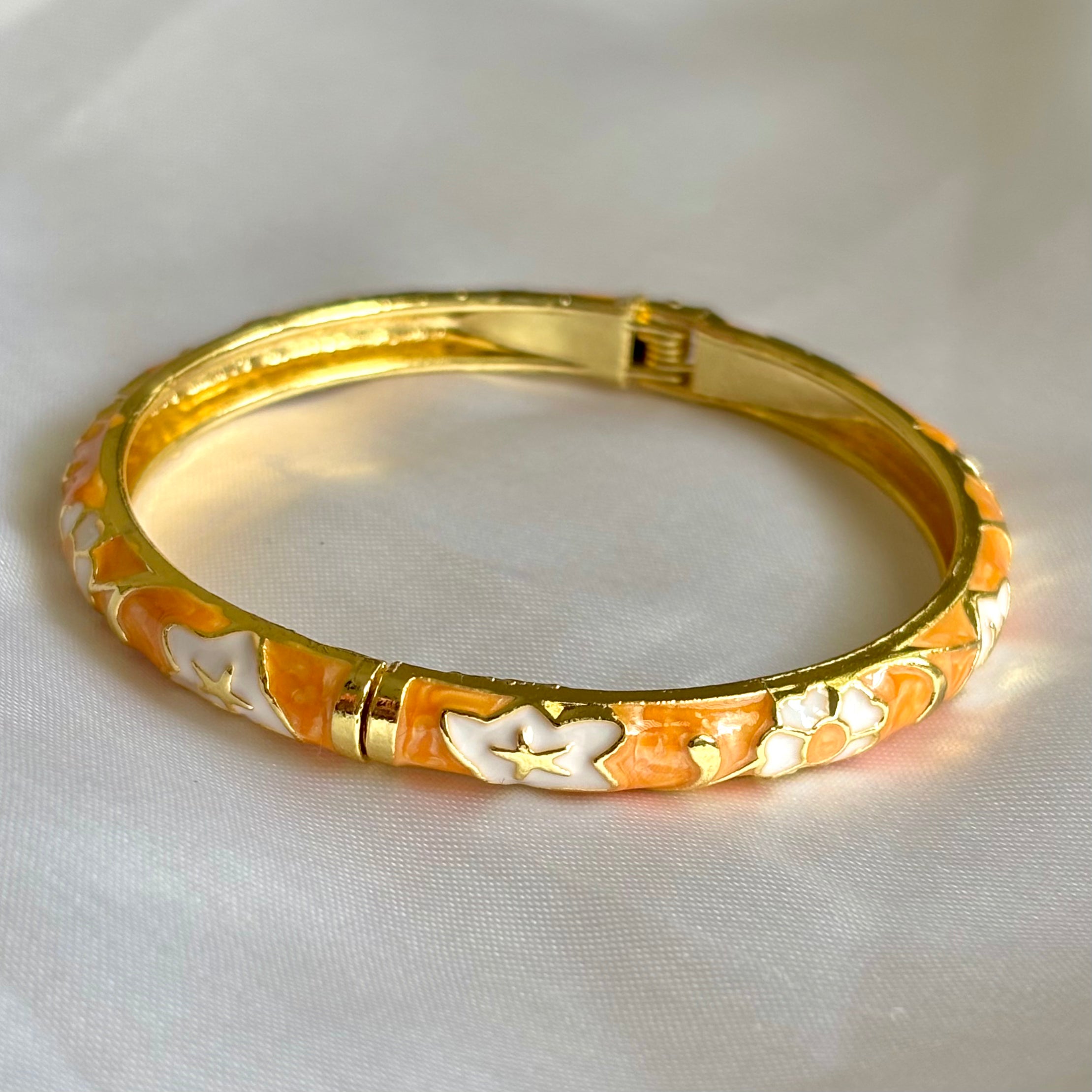 Orange floral enamel kada