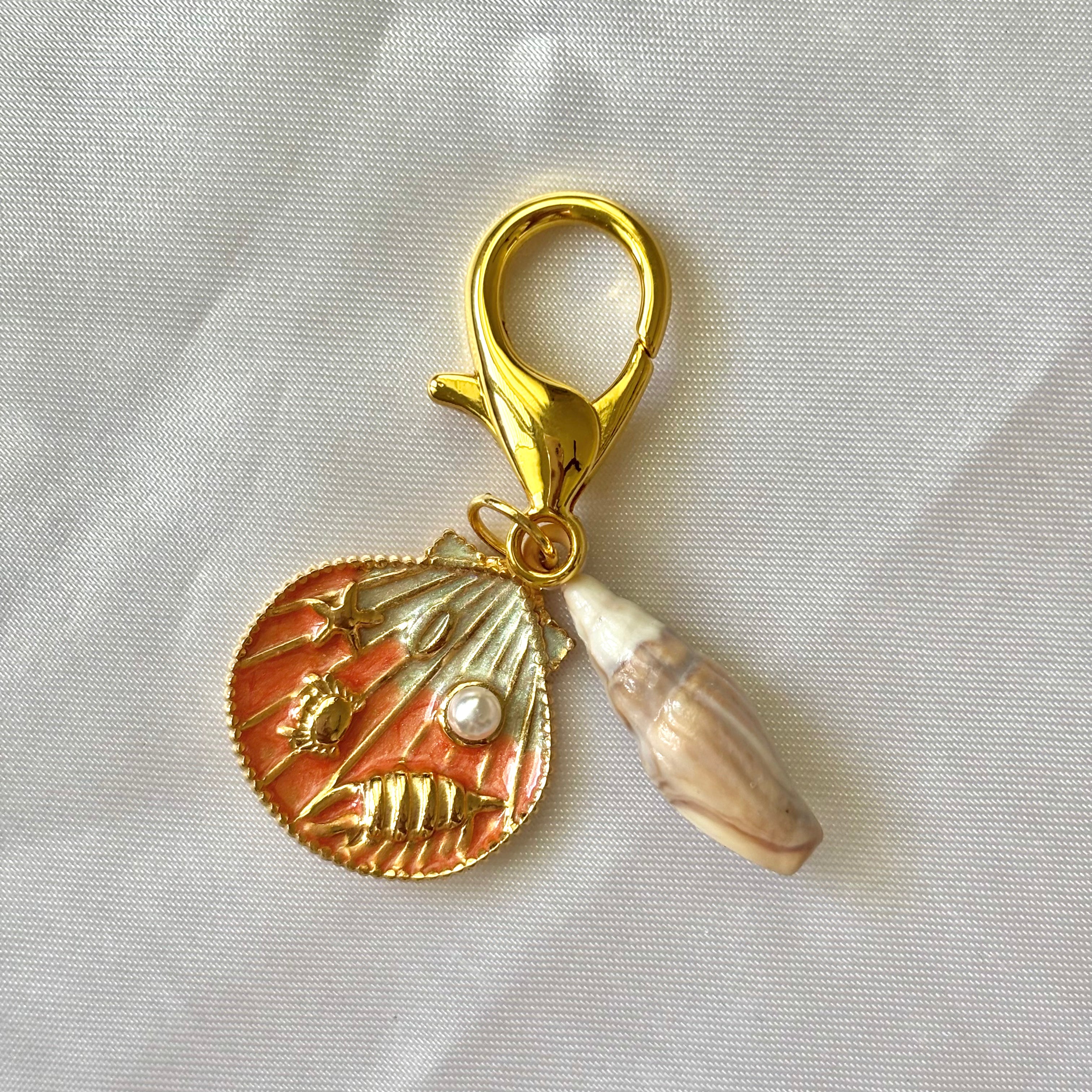 Orange sea stamp shell keychain