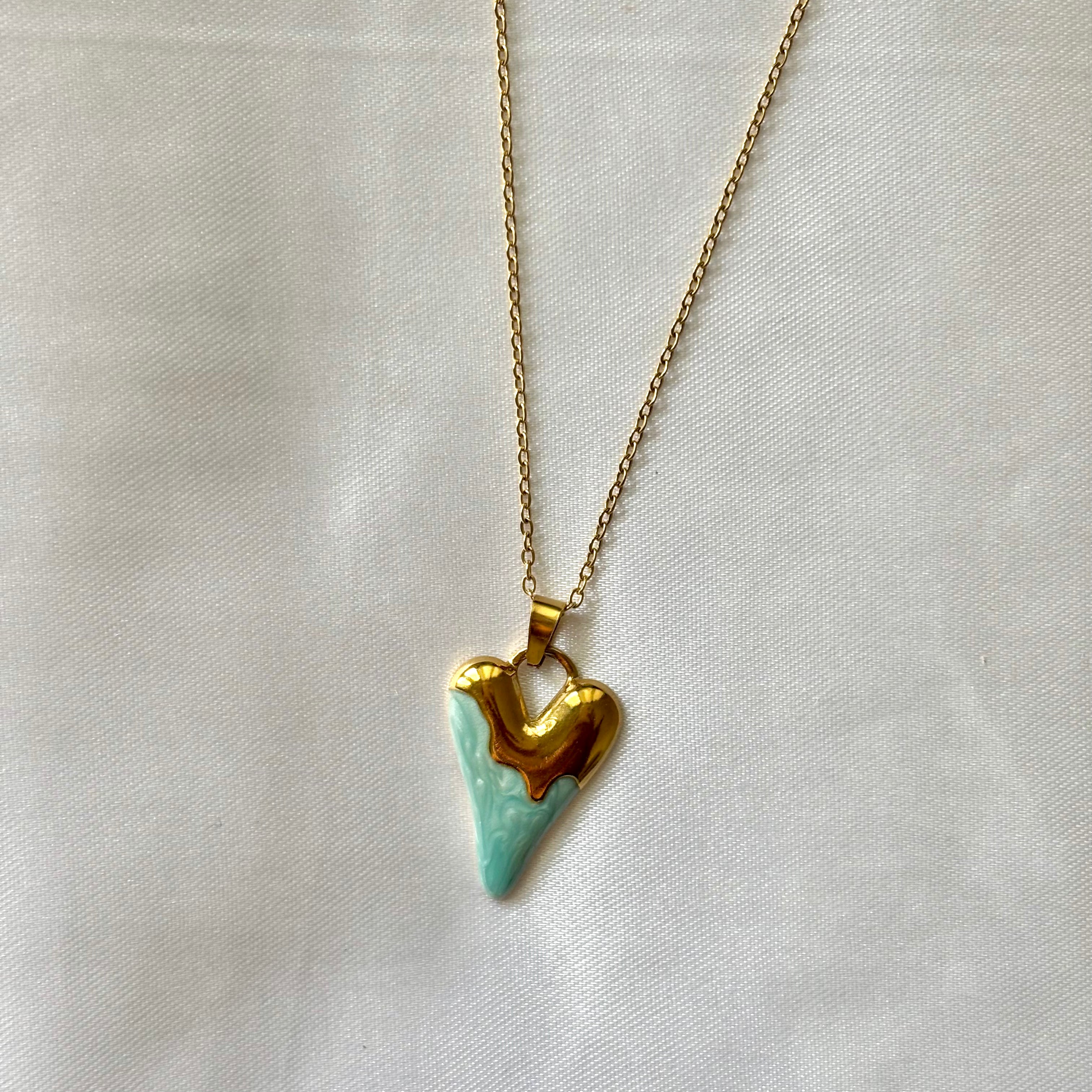 Melting blue heart pendant
