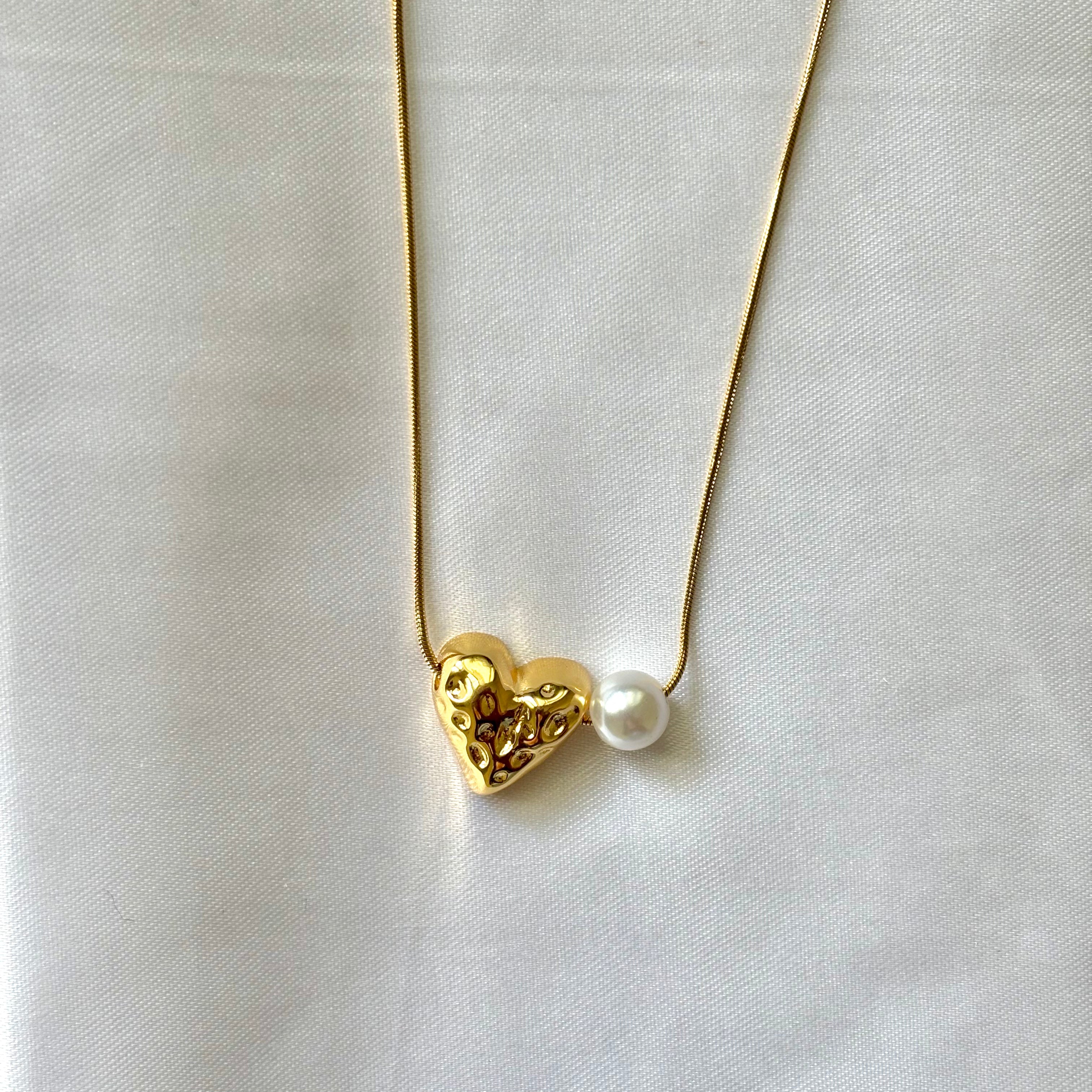Hammered heart and pearl pendant
