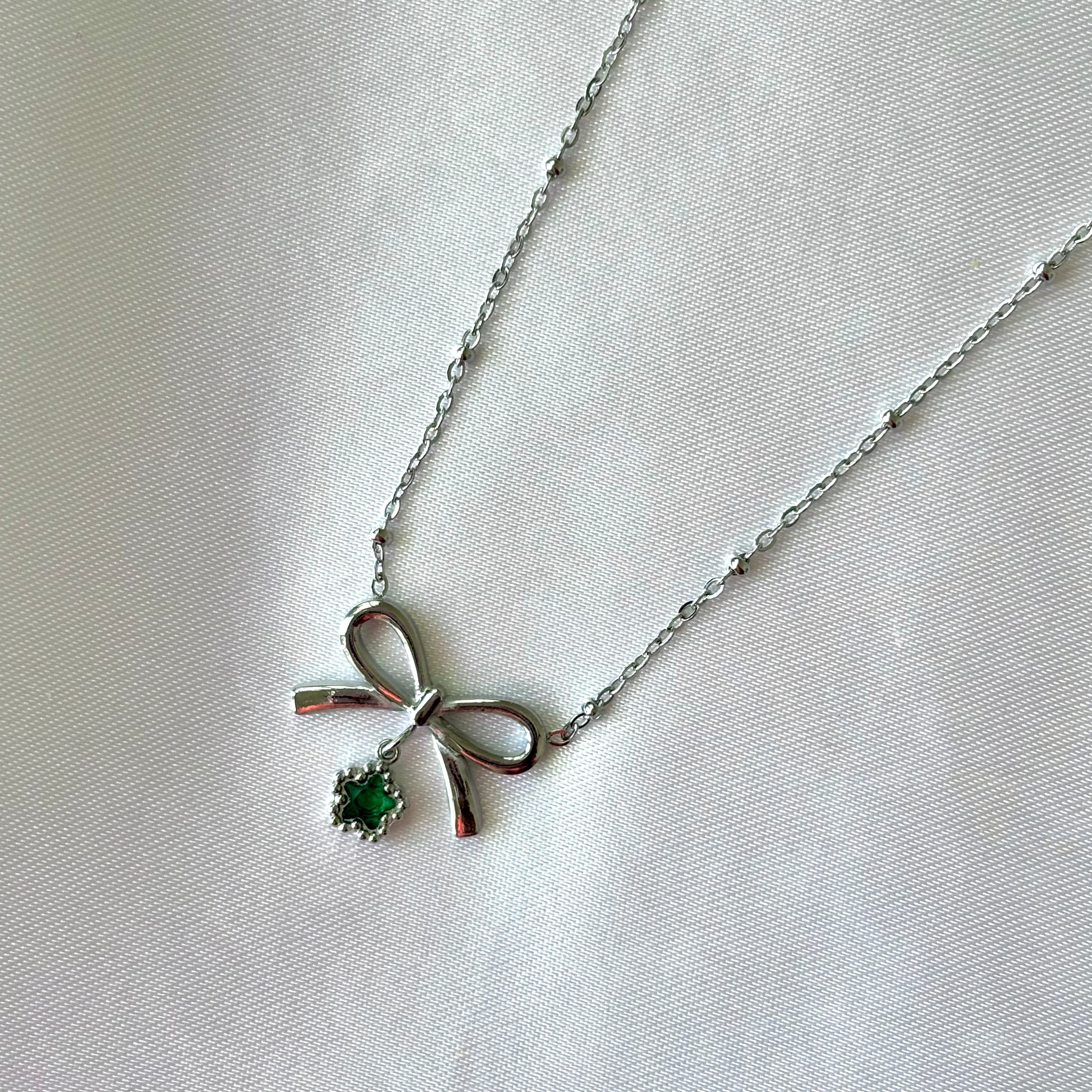 Green flower bow pendant